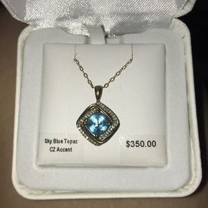 Sky blue topaz w/ CZ accent
